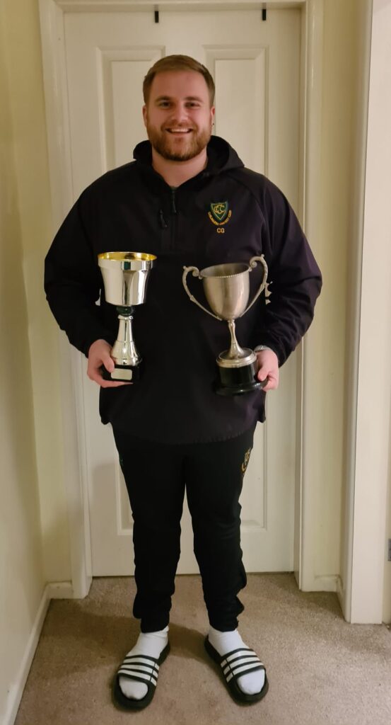 Connor Glendinning with his 1st XI Batting and 1st XI Bowling 2021 trophies