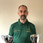 Matthew Ellis with his Clubman of the Year & 2nd XI Batting 2021 trophies