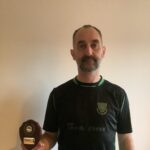 Matthew Ellis with his Team of the Decade shield
